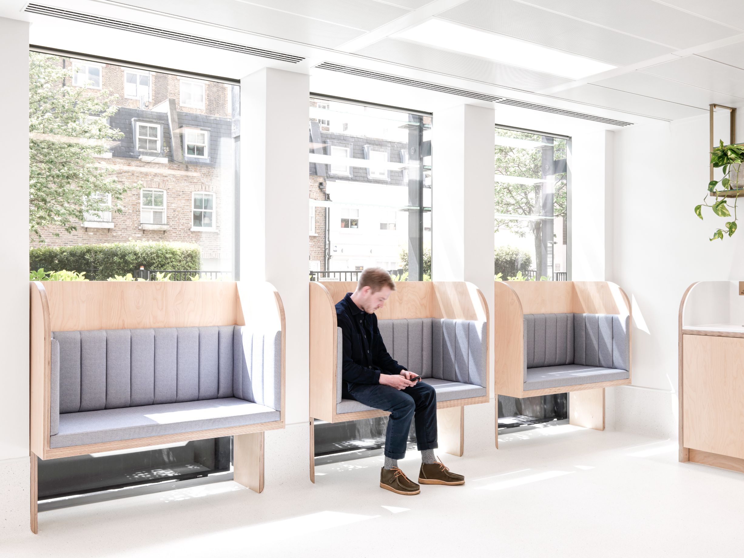Plastic waiting room chairs have been replaced with comfortable seating options