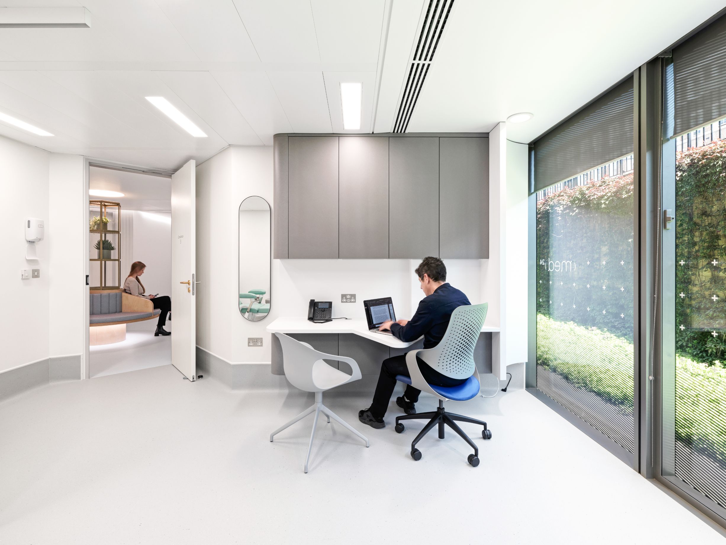 There is no formal desk separating clinician and patient