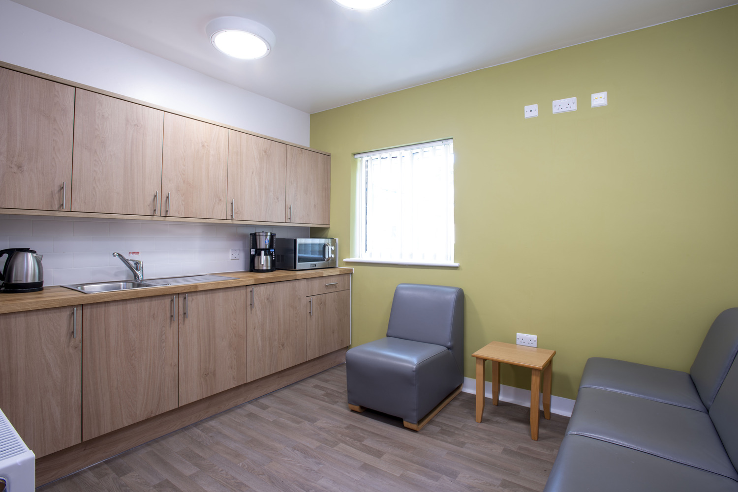 The unit includes kitchens and communal areas