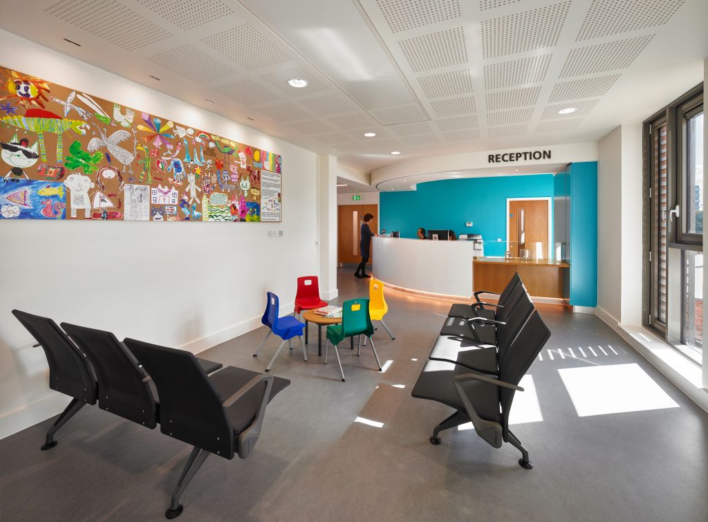 The building houses a health centre, elderly daycare facility, and an addictions unit