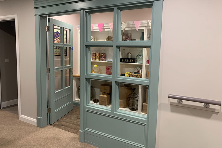 The building includes sweet shops and a hair salon