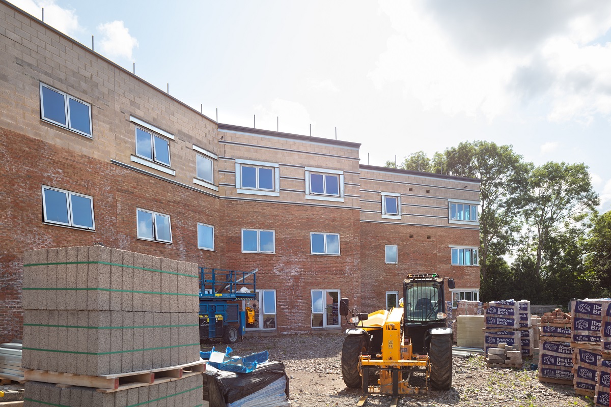 The topping-out ceremony marked the last beam being laid to complete the main structure
