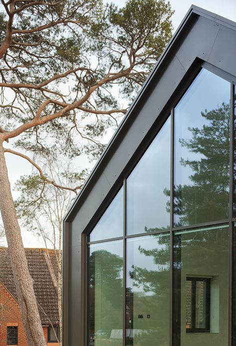 Large areas of glazing and rooflights bring natural light into the building